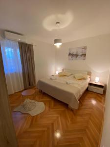 Posteľ alebo postele v izbe v ubytovaní Apartment Darija with private pool + 20 fotografií