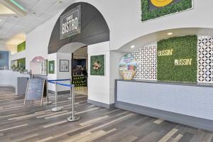 a fast food restaurant with a cash counter in a store at Luxury 20th Floor 2 BR Condo Direct Oceanfront Resort Daytona Beach | 2027 in Daytona Beach +49 photos