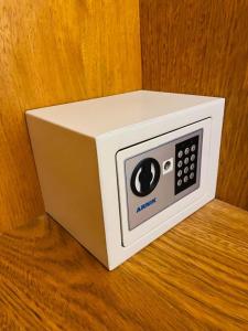 a white microwave oven sitting on top of a table at Ranqueles in Villa Carlos Paz +12 photos