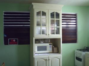 Kuchyň nebo kuchyňský kout v ubytování LeMarida Suites