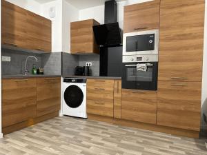 Photo de la galerie de l'établissement Agréable 2 pièces avec balcon et Parking transports by immo kit bnb, à Sarcelles