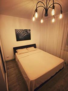 Una cama o camas en una habitación de RR Residence