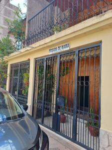 庫斯科的住宿－Posada de Mama，建筑的一侧有门