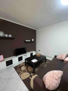 Televisyen dan/atau pusat hiburan di Pink House: intero appartamento