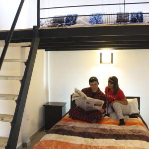 Giường trong phòng chung tại Chalets Rancho Jerónimo +28 ảnh