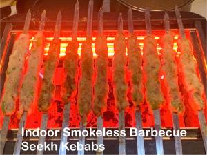 a bunch of skewers cooking on a grill at Fully Air-Conditioned Bedroom w 2 Double Beds & King Size Sofa Bed w Ensuite Bathroom Near Grand Union Canal - FREE Parking in Southall