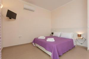 Posteľ alebo postele v izbe v ubytovaní Corfu Sea View Villa - Alya