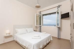 Posteľ alebo postele v izbe v ubytovaní Corfu Sea View Villa - Alya