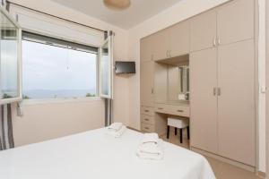 Posteľ alebo postele v izbe v ubytovaní Corfu Sea View Villa - Alya