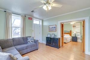 a living room with a couch and a bed at Remodeled Pioneer Home in Hurricane with Patio! in Hurricane