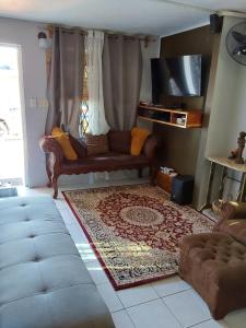 Posezení v ubytování Zipcode Hideaway Guesthouse