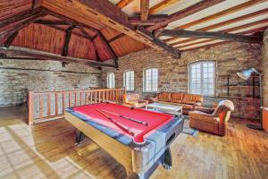 a room with a pool table in a building at Maison Nelson in Villecerf