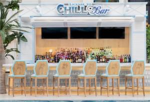 a group of chairs sitting in front of a bar at Margaritaville Resort Lake Tahoe in South Lake Tahoe