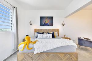 Villa Kiwi 3 min to the Beach with Private Magnesium Pool & Dive Rinse Tank客房内的一张或多张床位