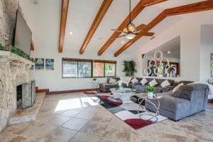 A seating area at Spacious Villa in Coral Springs with Pool and Hot Tub!