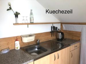 Kuchyň nebo kuchyňský kout v ubytování Pod-Inn 坡顶公寓-文化谷仓