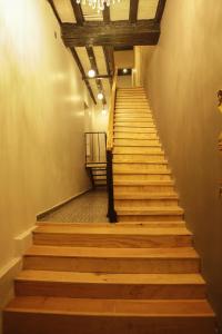 a staircase leading up to a stair case at Capsule Hostel in Mexico City