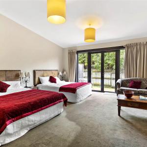 Llit o llits en una habitació de Gateway Motor Inn