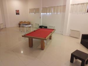 a living room with a ping pong table in it at Artemis I - BRC in San Carlos de Bariloche