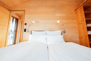 Ένα ή περισσότερα κρεβάτια σε δωμάτιο στο Migat Design - Haus 2 +48 φωτογραφίες