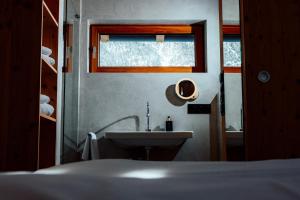 Ένα ή περισσότερα κρεβάτια σε δωμάτιο στο Migat Design - Haus 2