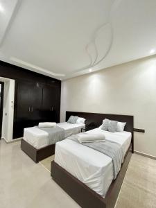 Posteľ alebo postele v izbe v ubytovaní Appartement Duplex élégant et calme Marrakech Menara