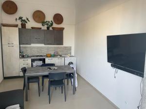 Η κουζίνα ή μικρή κουζίνα στο La Casa di Pina