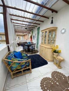 En balkon eller terrasse på Mansão beira mar