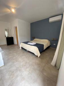 Katil atau katil-katil dalam bilik di Complejo El Faro