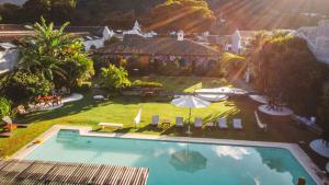 an aerial view of a house with a swimming pool at Yes Please! Hostel in Antigua Guatemala