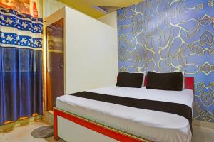 Katil atau katil-katil dalam bilik di OYO Golden Moment Guest House