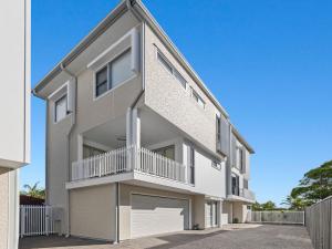 an image of an apartment building with a balcony at Serenity Sands Townhouse in Kingscliff
