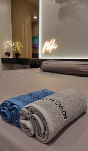 Postel nebo postele na pokoji v ubytování NBK Homestay - Beverly Solari Vinhomes Grand Park