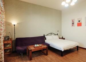Postel nebo postele na pokoji v ubytování Jia Lin Homestay