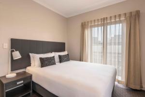 Postel nebo postele na pokoji v ubytování Frome Apartments
