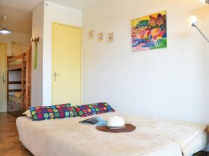 Postelja oz. postelje v sobi nastanitve Appartement Bormes-les-Mimosas, 1 pièce, 4 personnes - FR-1-251-560