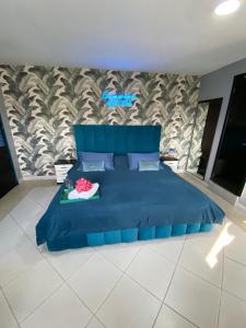 Postel nebo postele na pokoji v ubytování SUITES FullHouse