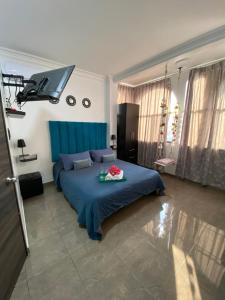 Postel nebo postele na pokoji v ubytování SUITES FullHouse