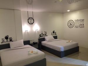 Letto o letti in una camera di GC Suites