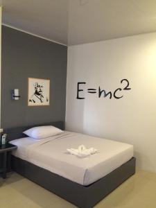 Letto o letti in una camera di GC Suites