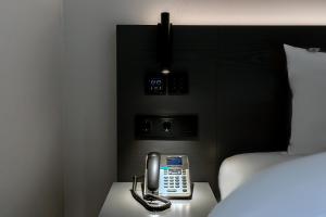Krevet ili kreveti u jedinici u objektu Hound Hotel Mokpo Peace Plaza