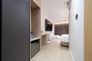 Krevet ili kreveti u jedinici u objektu Hound Hotel Mokpo Peace Plaza