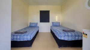 Postel nebo postele na pokoji v ubytování Toobeah hotel/motel