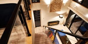 an overhead view of a staircase in a house at Rakuten STAY VILLA Yamanakako in Yamanakako +23 photos