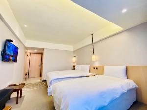 Fotografie z fotogalerie ubytování Inn by the Village v destinaci Tchaj-tung