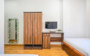 Letto o letti in una camera di Khách Sạn Lối Về Đà Lạt
