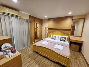 Postel nebo postele na pokoji v ubytování Alaita Hostel Patong
