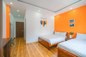 Letto o letti in una camera di Khách Sạn Lối Về Đà Lạt