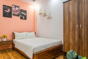 Letto o letti in una camera di Khách Sạn Lối Về Đà Lạt