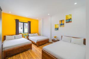 Letto o letti in una camera di Khách Sạn Lối Về Đà Lạt